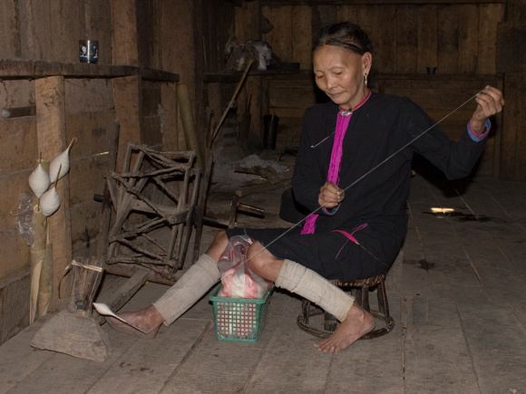 Spinning cotton in a Lantien village