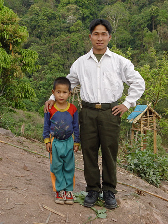 Mr Assi, headman of Ban Nammat Gao and his son Adjeu